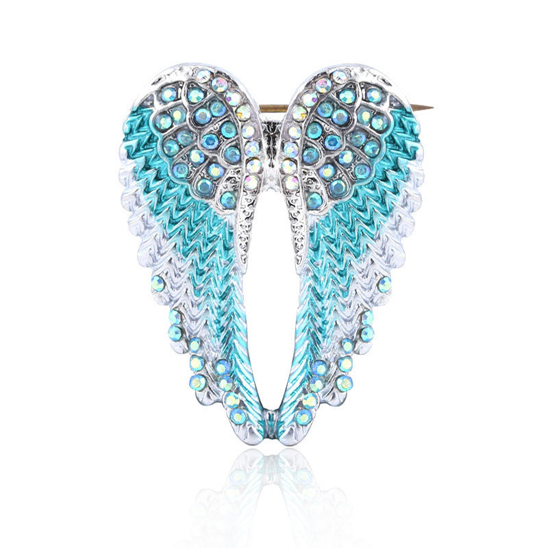 Angel wings brooch